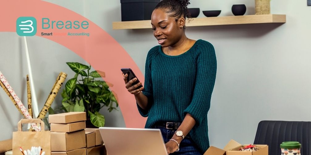 Sole trader checking business finances as bookkeeping falls behind with Brease online accounting support.